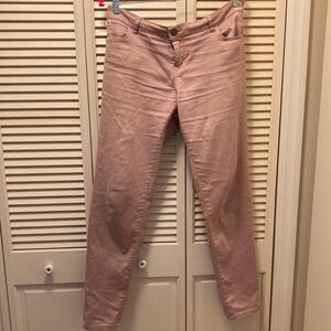 Blush colored skinny jeans